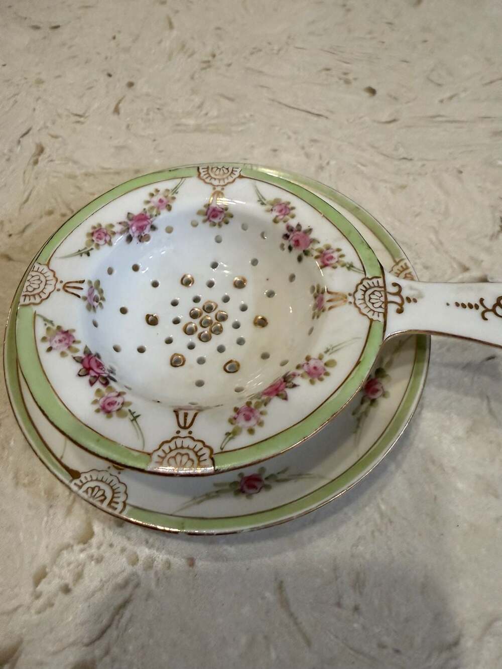 Antique Nippon hand painted tea strainer